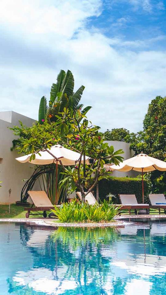 chairs besides the swimming-pool