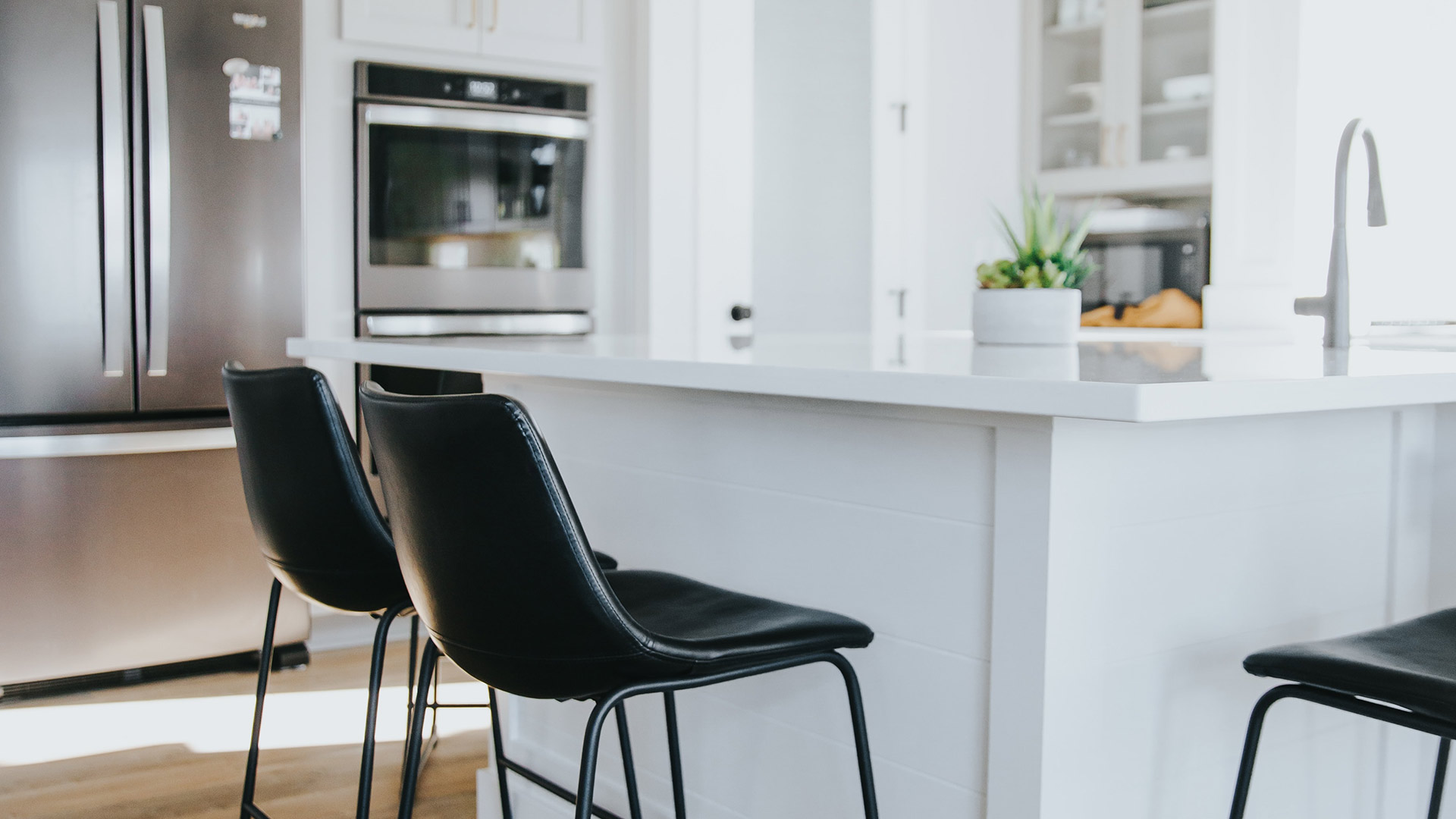 kitchen area with dining table and chairs